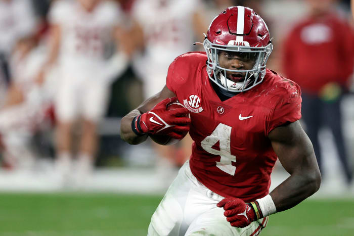 Alabama Crimson Tide running back Brian Robinson Jr. (4) carries the ball against the Arkansas Razorbacks during the second half at Bryant-Denny Stadium.
